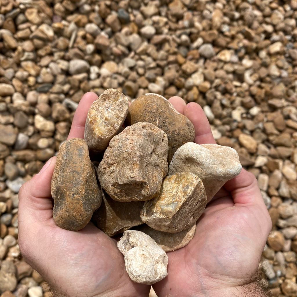 1.5 Inch River Rock - Sold Per Yard - Stone & Leaf Landscaping